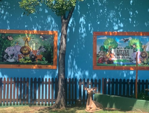 garden with buck and wall posters
